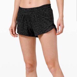 Black Athletic Shorts with Elastic Waistband and Curved Hem